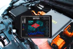 Technician checking an electric car battery's health.